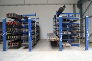 Roll out cantilever rack in use holding material